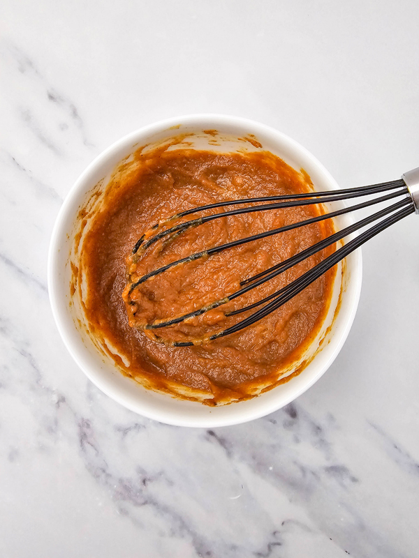 mix together ingredients to make pumpkin filling