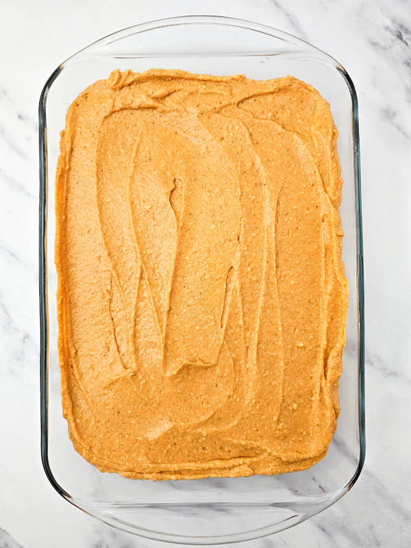 spread pumpkin layer on top of cheesecake layer