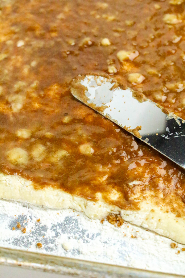 spread mashed banana over cinnamon mixture layer