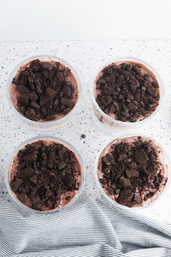 add crushed oreos to the top of the pudding layer