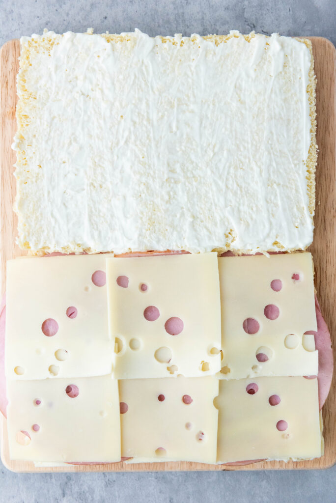 add more cheese on top of ham