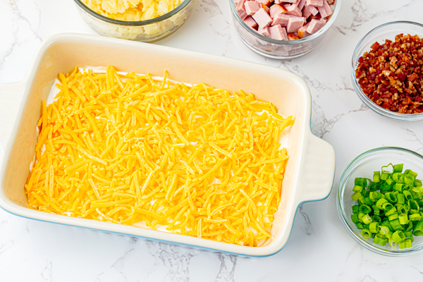 add shredded cheddar on top of cream cheese mixture.