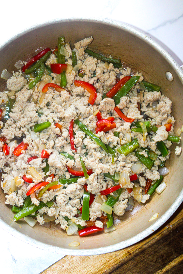 add ground chicken and cook until done