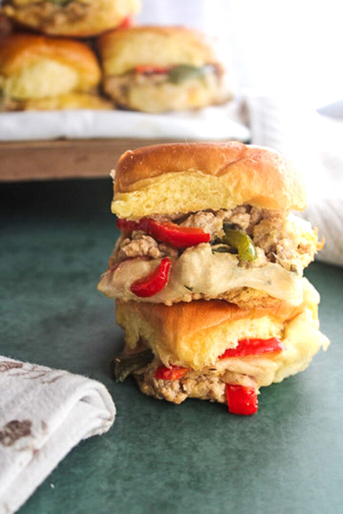 closeup of finished philly chicken cheesesteak sliders