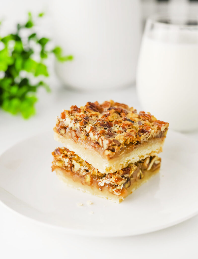 stack of pecan pie bars on a plate