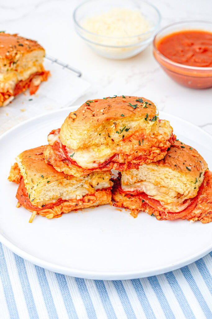 stack of pepperoni pizza sliders on a plate