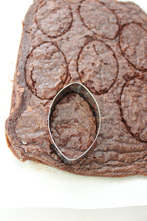 use the football shaped cookie cutter to cut the brownies