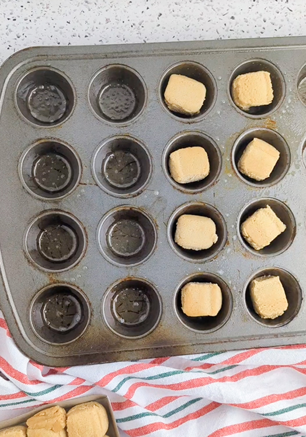 place dough into mini muffin tin and bake