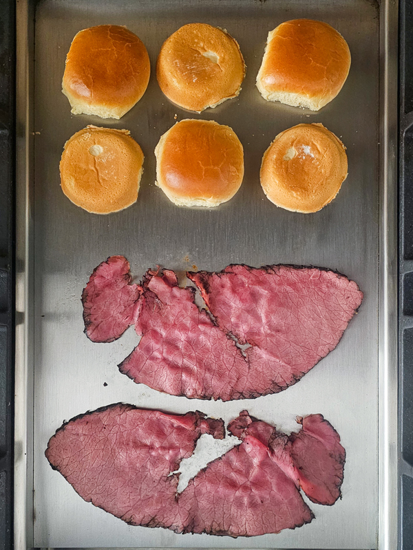 warm the buns and pastrami on a griddle or grill plate
