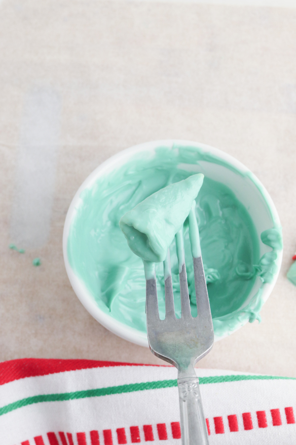 allow excess candy to drip off before placing on parchment to dry.