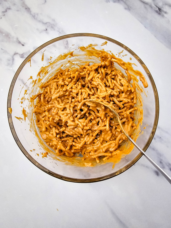 mix the chow mien noodles into the peanut butter mixture until coated