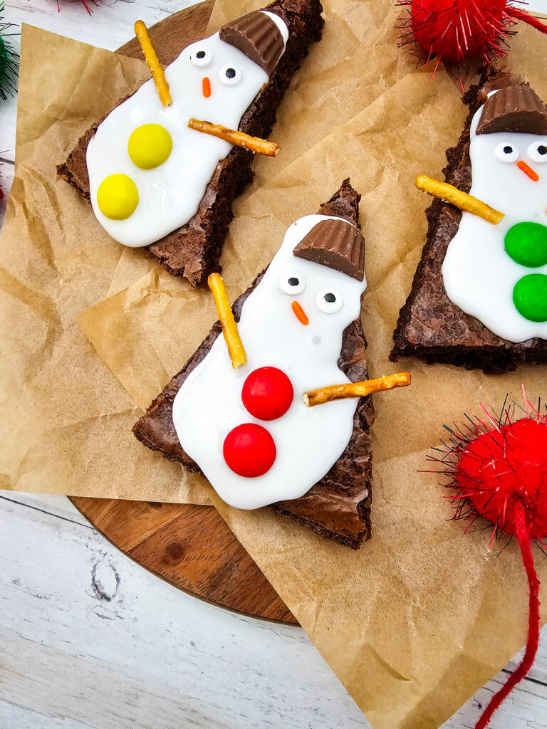 closeup of snowman brownies after decorating