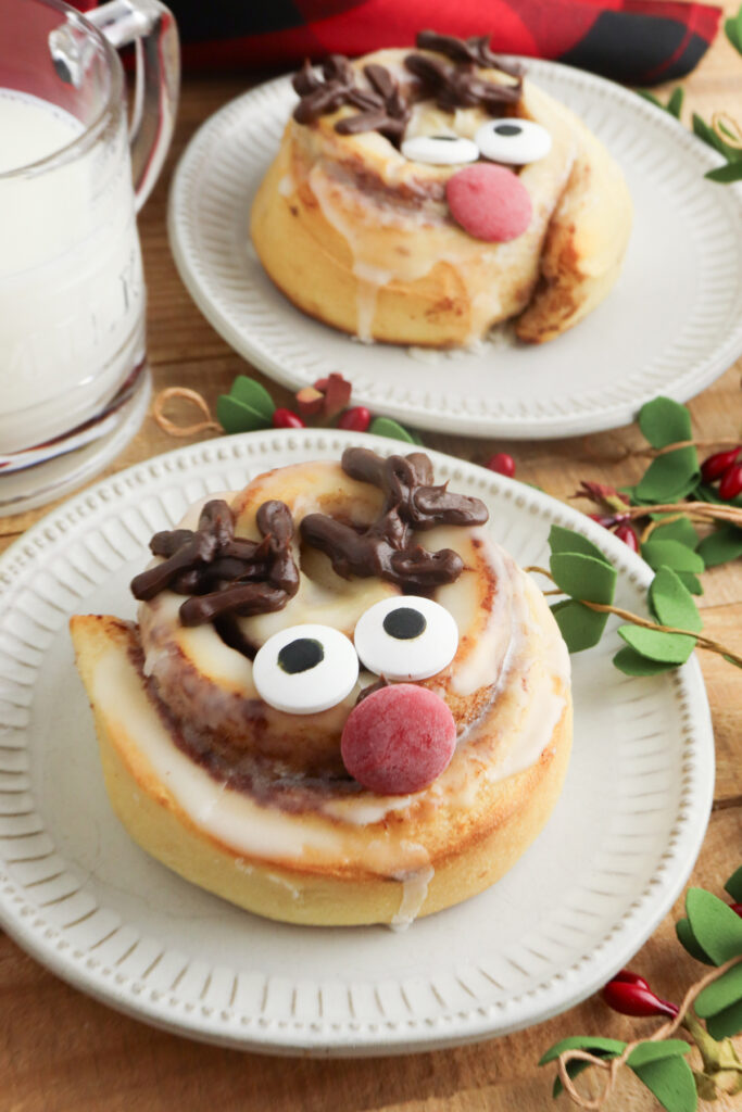 closeup of finished cinnamon roll on a plate