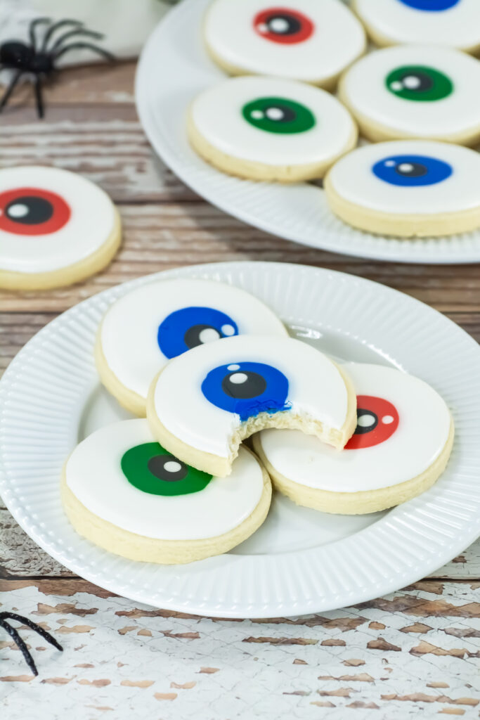 stack of halloween eye cookies on a plate