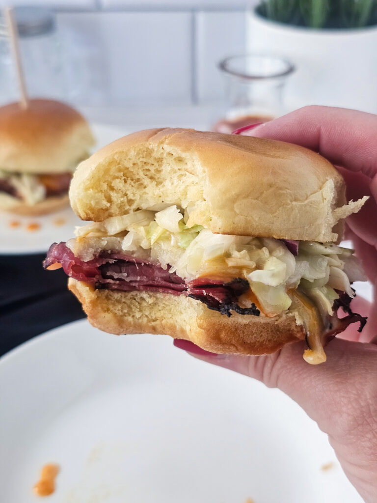 closeup of the inside of a pastrami slider