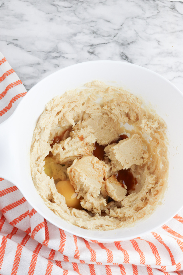 beat together the butter and sugar then add eggs and vanilla.