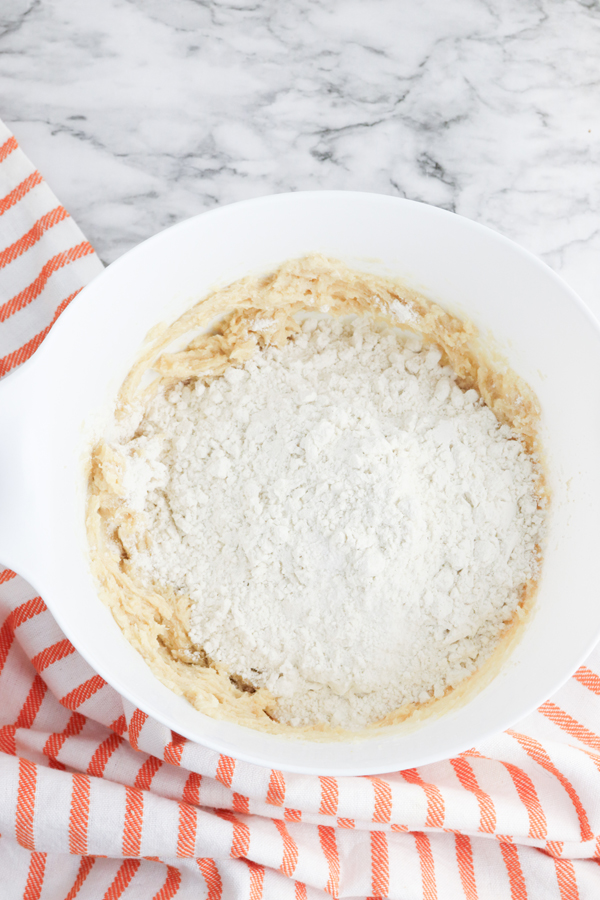 add flour, baking soda, and salt. mix together until smooth.