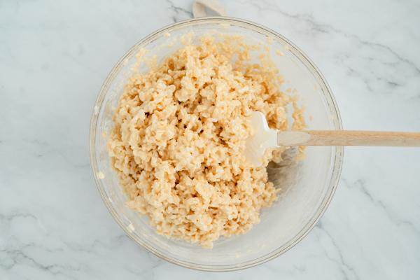 add the cereal to the bowl and stir until evenly coated