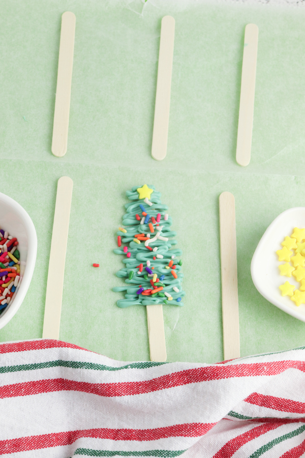 add star and sprinkles to the candy before it hardens