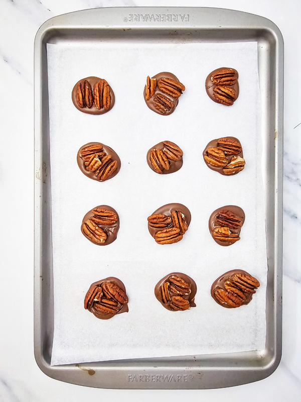 add pecans on top of chocolate circles