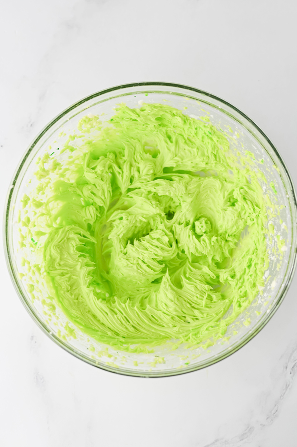 mix together frosting ingredients and tint green with the food coloring