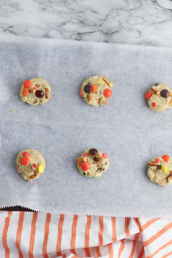 place the dough balls on a parchment lined baking sheet at least 1" apart