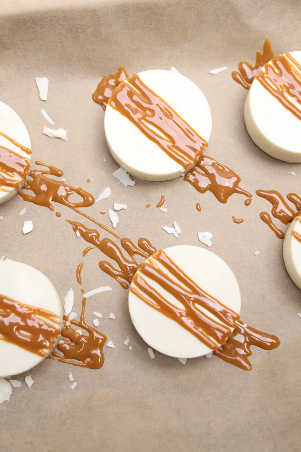 drizzle melted cookie butter over the top of each treat and top with crushed cookies