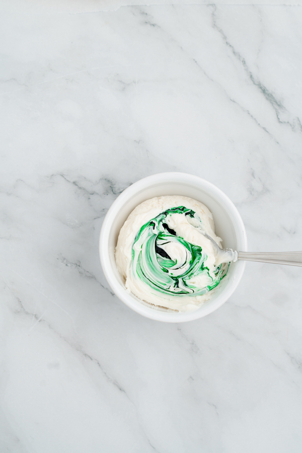 tint the other bowl of icing green