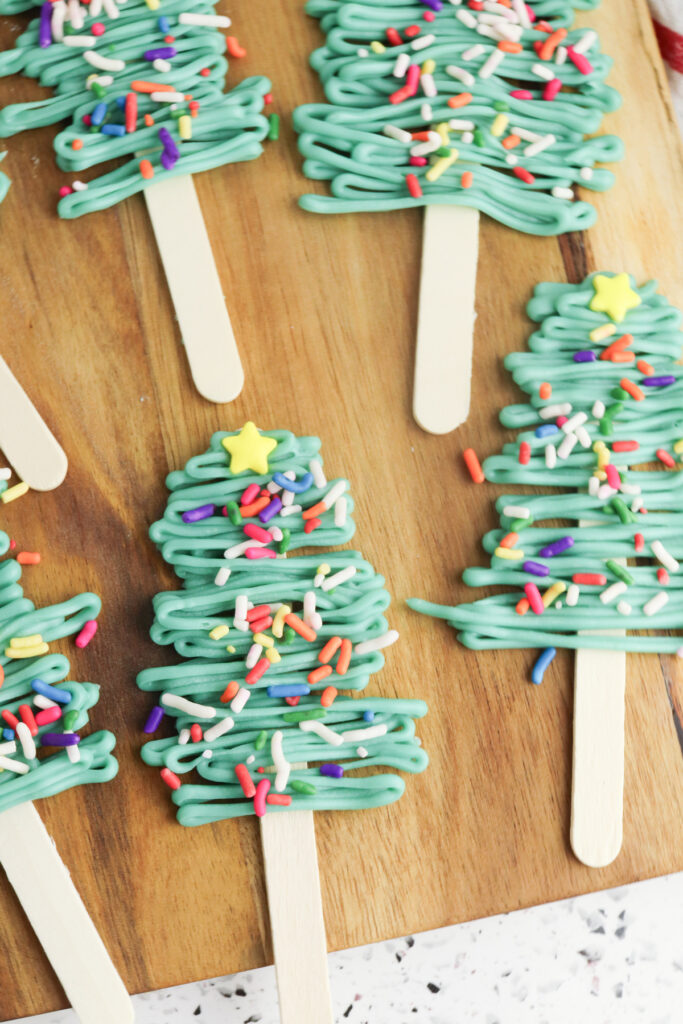 Christmas tree candy pops on a counter