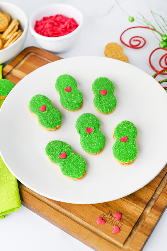grinch nutter butter cookies on a plate
