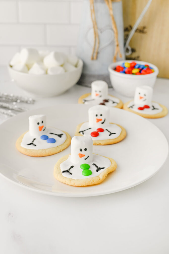 melted snowman cookies on a plate