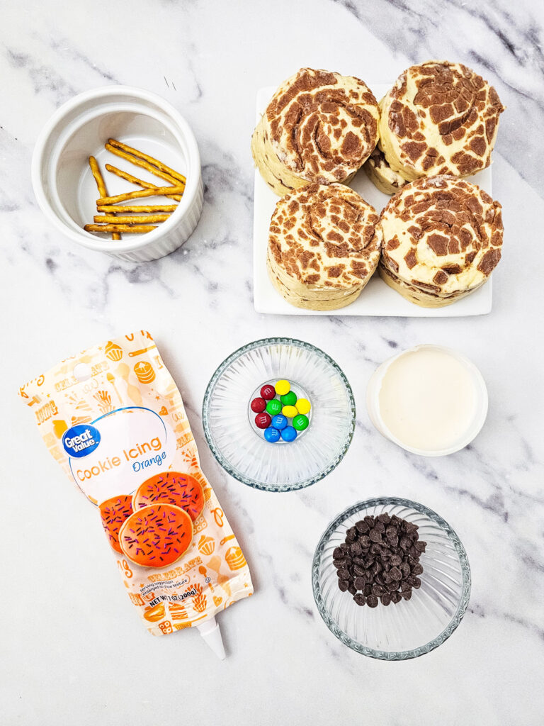 overhead shot of ingredients for snowman cinnamon rolls