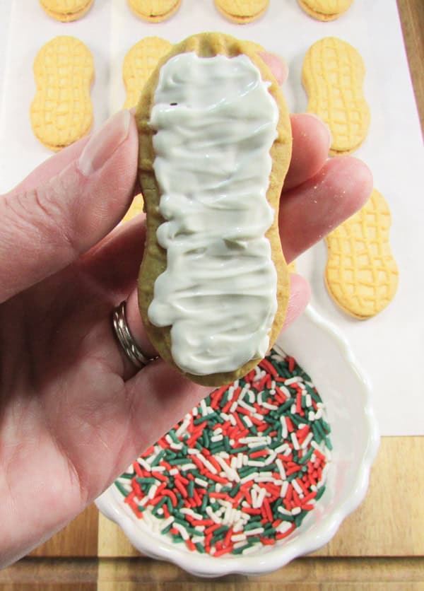 pipe the candy on each cookie in a zig zag motion