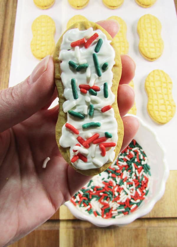 apply the sprinkles on top of the candy