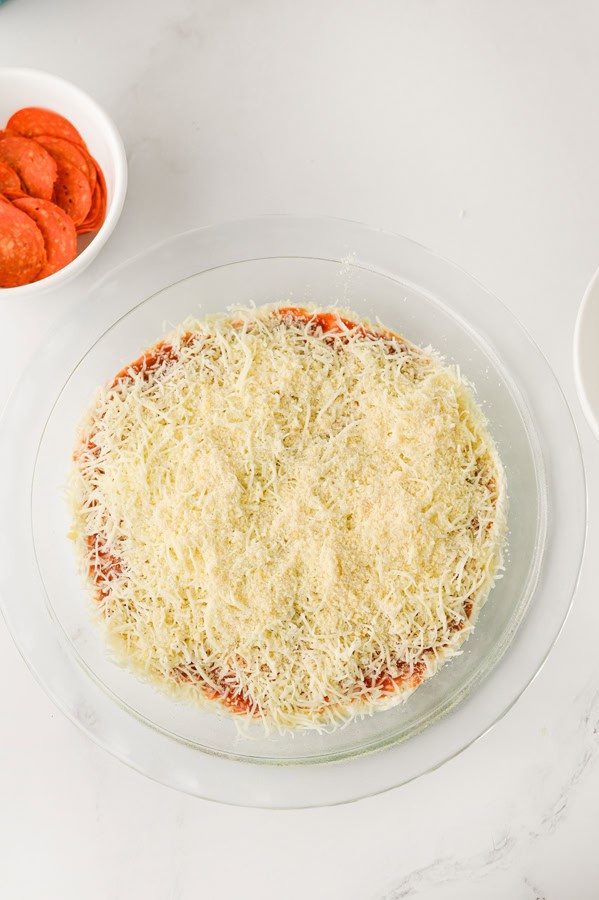 add the shredded cheese