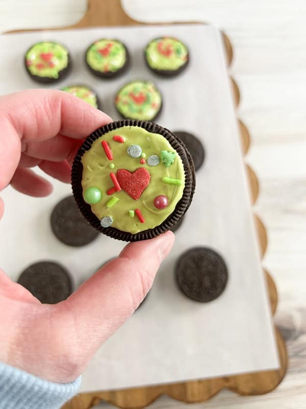 apply sprinkles to candy