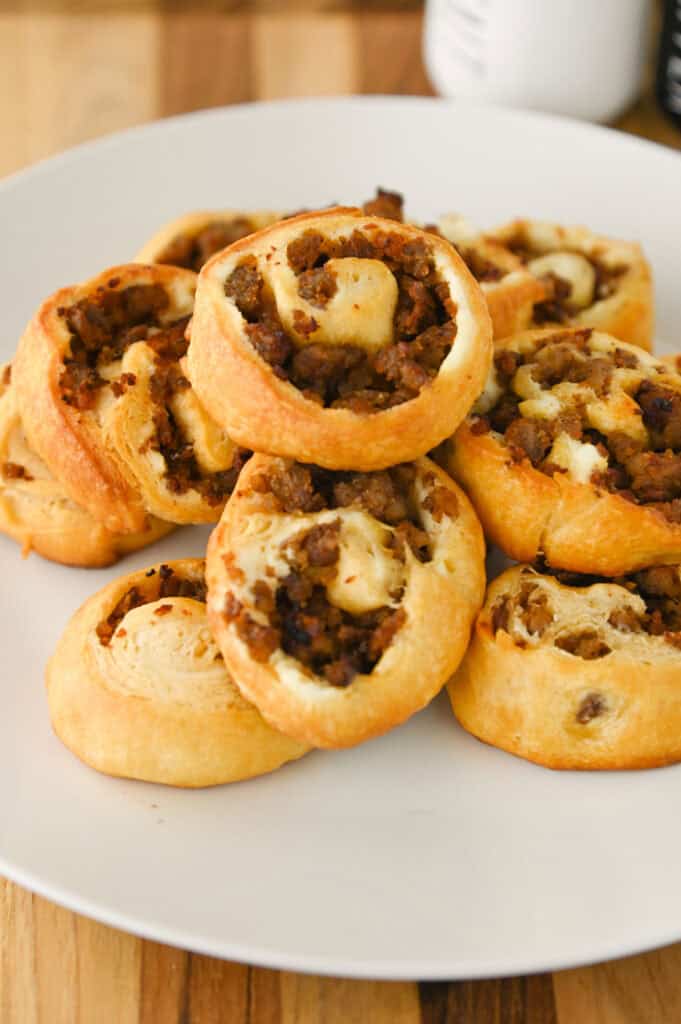 closeup of sausage cream cheese pinwheels on a plate