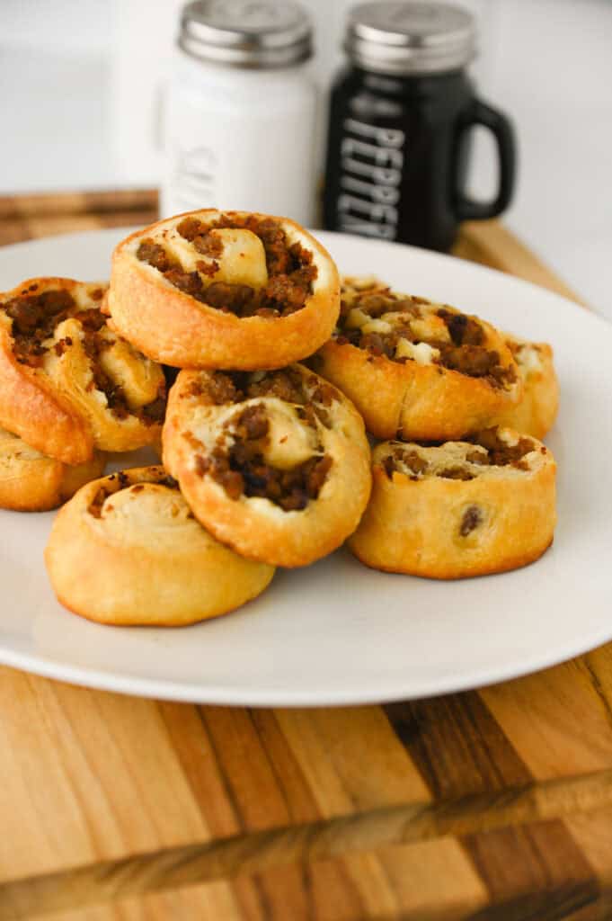stack of sausage pinwheels on a plate