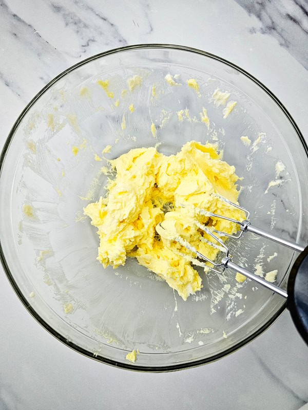 add eggs, extract, and salt and mix until smooth