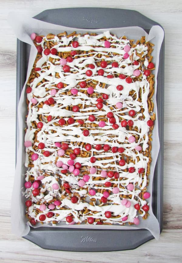 add the m&ms on top of white candy