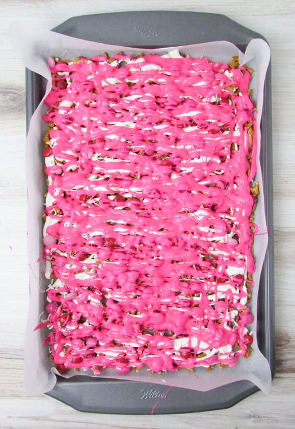 drizzle the pink candy, making sure to get the edges