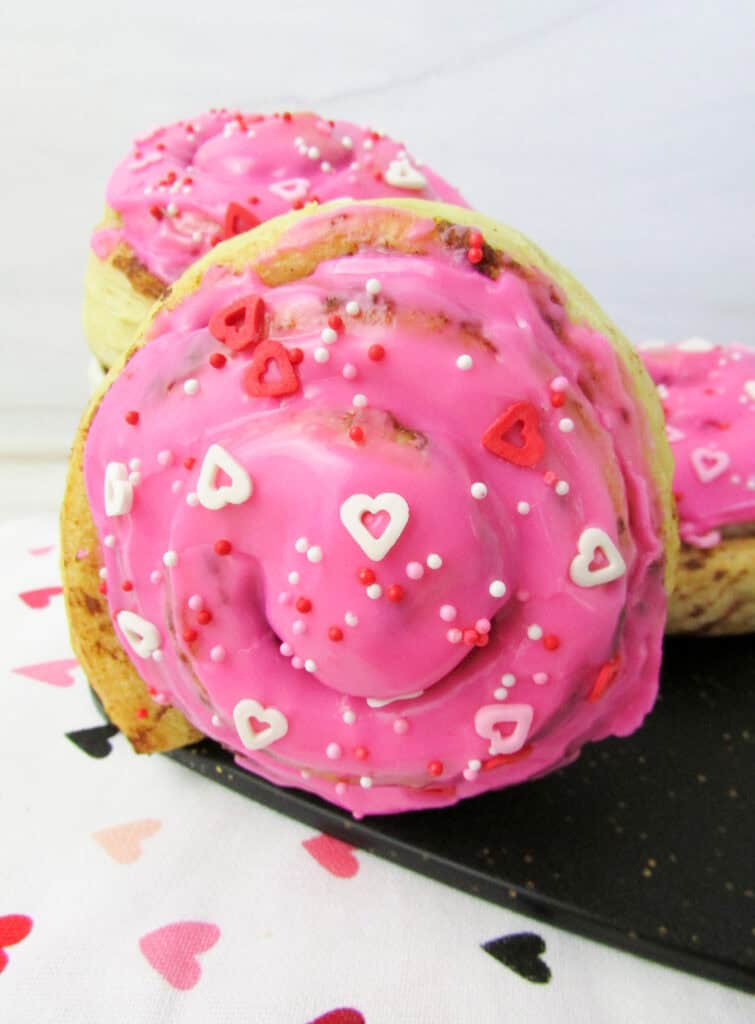 closeup of finished cinnamon roll after decorating