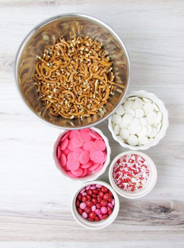 overhead shot of ingredients for valentines pretzel candy bark